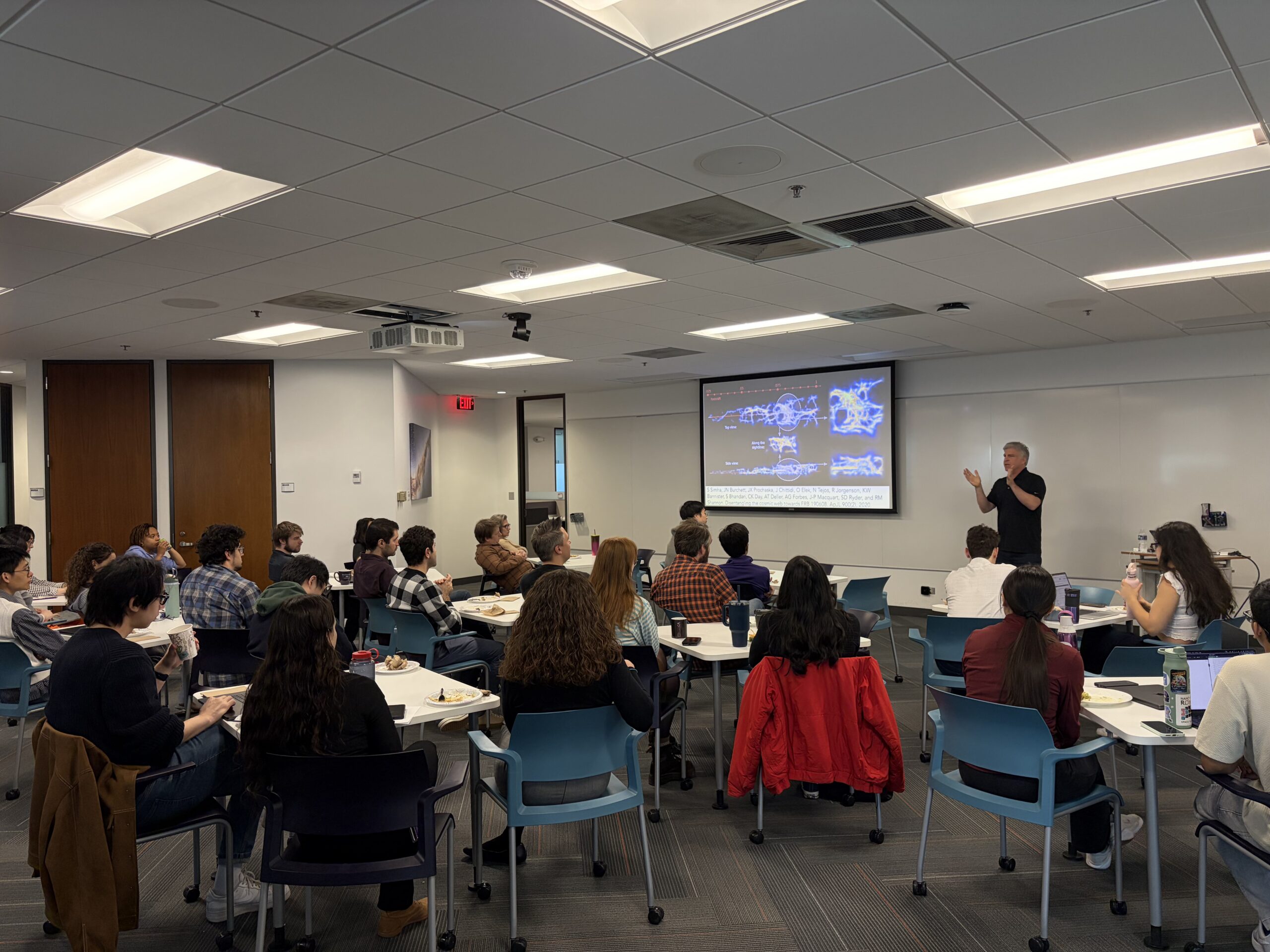 Angus Forbes presenting to a room of seated students and other guests at CIERA Connections.