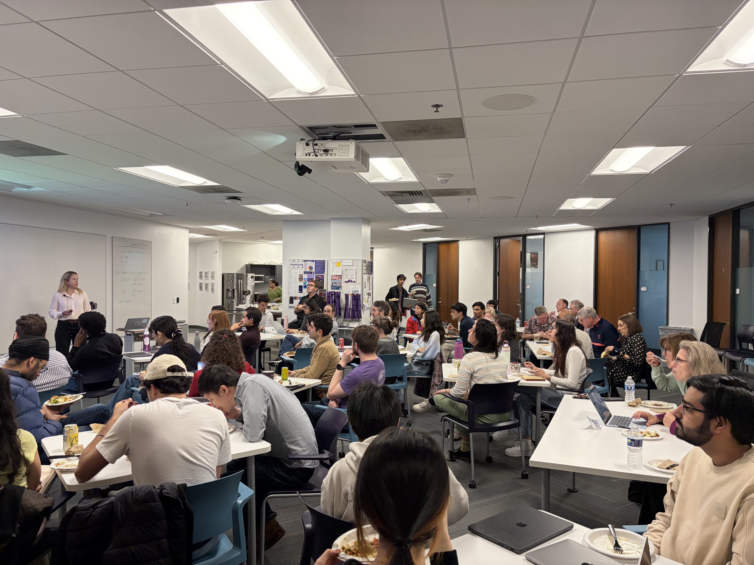 Francesca Valsecchi presenting to a room of seated students and other guests at CIERA Connections.